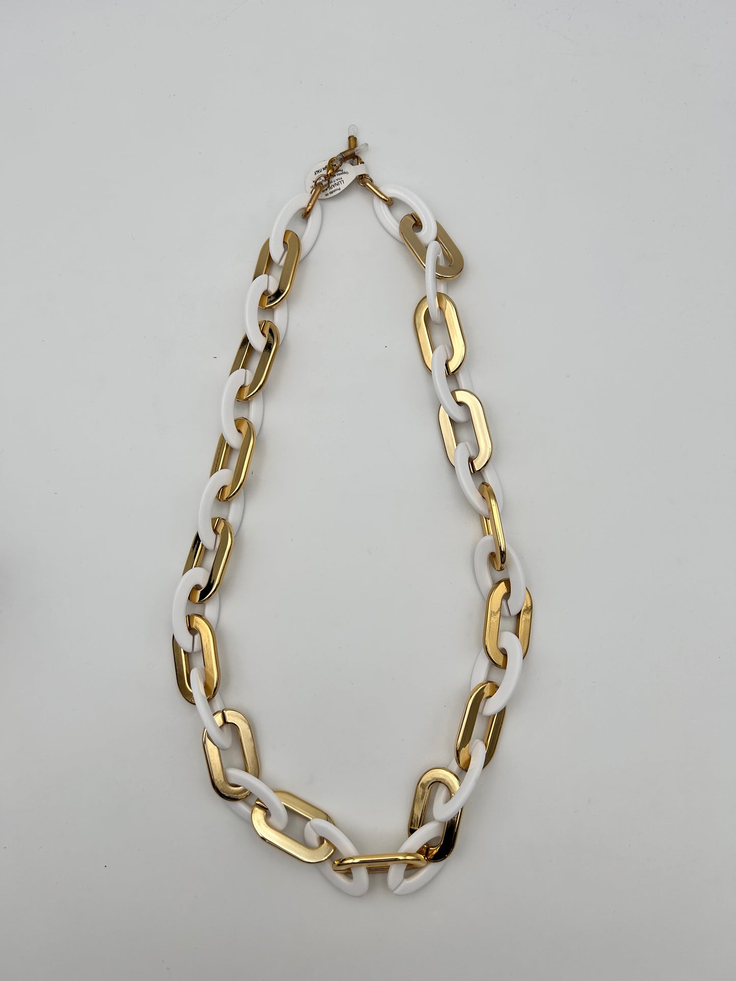 Catena grande bianca e oro