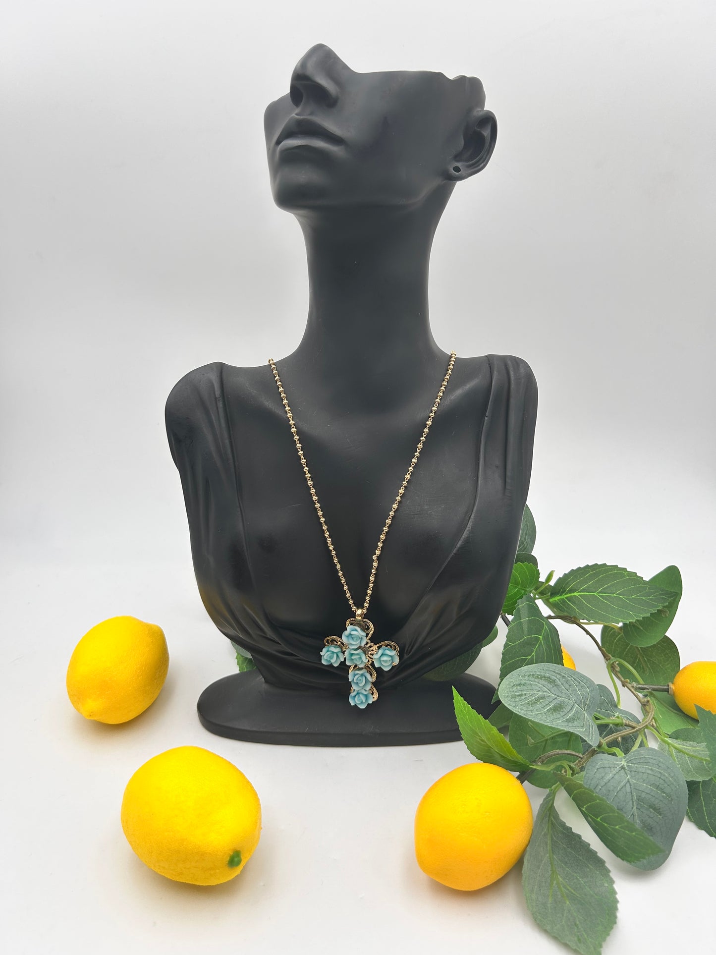 Collana croce con fiori